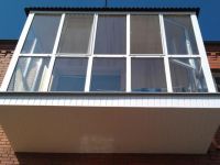 остекление балкона окнами в пол с выносом